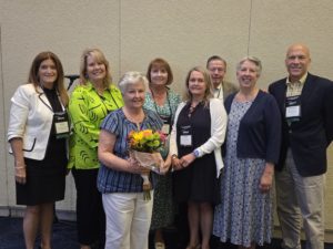 Sr. Peggy Scarano with colleagues at Caritas