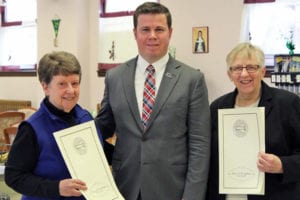 Orangetown Supervisor Chris Day and two sisters