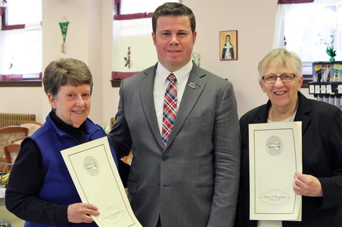 Orangetown Supervisor Chris Day and two sisters