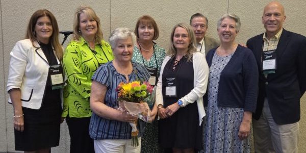 Sr. Peggy Scarano with colleagues at Caritas
