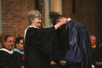 graduate receiving honor